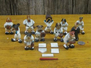 Vintage Carved Wooden Dog Baseball Team