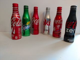 Set Of 6 Coca Cola Aluminum Bottles Sprite,  Coke,  Music,  Olympics.