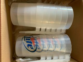 11 Plastic Beer Pitchers - 5 Miller,  6 - Clear