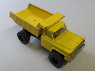 Vintage Pressed Steel Chevy Dump Truck Yellow Made In Japan Approx 8 1/2 " Long