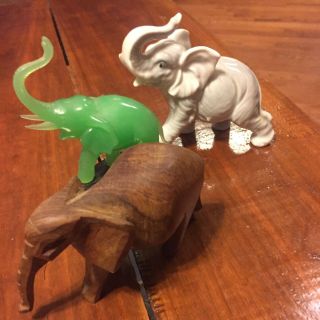 Three Small Elephants Figurines.  Wood,  Porcelain,  And Green Jade On Base