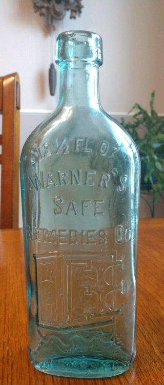 Rare Antique Warner’s Safe Remedies Co.  Bottle 12.  5 Oz.  9 1/4 " Aqua