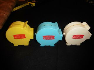 3 Vintage Coca - Cola Fishtail Banks Blue,  Yellow,  & White 3 Inches Tall Very Good