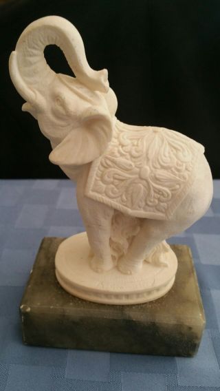 A Giannelli Vintage Alabaster White Elephant Statue Green Alabaster Stand