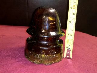 Dark Amber Black Glass H.  G.  Co.  Petticoat Glass Insulator Cracked - Pat.  1893