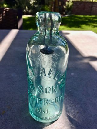 Hutchinson Bottle From Wm.  T.  Allen & Son Patterson N.  J.  With Stopper