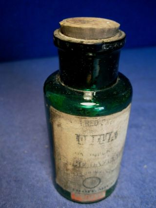Vintage Green Poison Bottle W/label
