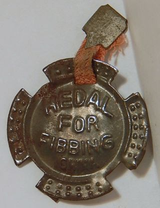 Vint Tin " Medal For Fibbing " Maltese Cross Cracker Jack? Prize Pin