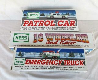 3 Hess Items 18 Wheeler And Racer - Patrol Car And Emergency Truck In Boxes