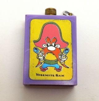 3 PERMANENT MATCH LIGHTERS,  2 LOONEY TUNES AND A 3RD ROADRUNNER & YOSEMITE SAM 2