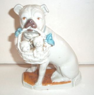 Antique Porcelain Sitting Pug Dog With Basket In Mouth With Puppies C1900