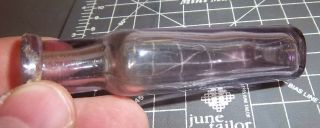 Vintage purple tinted glass bottle,  3.  5 x 1.  25 inches color 3