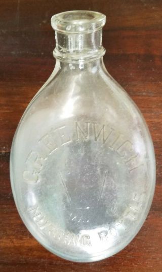Vintage Glass Embossed,  8 Ounce,  Greenwich Nursing Baby Bottle,  murder bottle 4