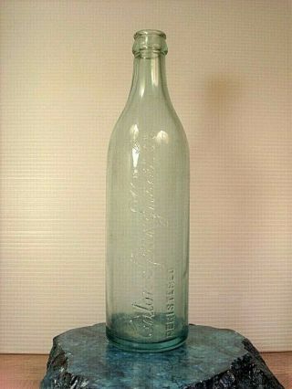 Vintage pale green water bottle CATON SPRING WATER CO in raised letters 10 