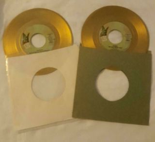 Queen 7 " Gold Singles: We Will Rock You/we Are The Champions; Bohemian Rhapsody