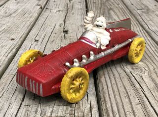 Michelin Man Bibendum Vintage Cast Iron Red Race Car