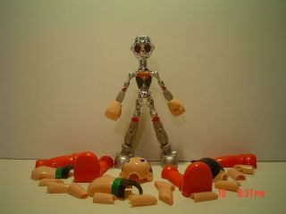 2004 ASTRO BOY FIGURE BY TEZUKA / SPEJ,  EYES LIGHT UP,  OUTER SHELL COMES OFF,  EX 4