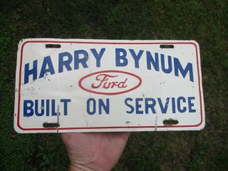 Vintage Leland Miss.  Harry Bynum Ford Auto Booster Vanity License Plate Tag Sign