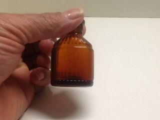 Small Antique Amber Ridge Poison Bottle. 4