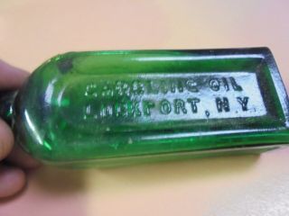 Vintage Dark Green Gargling Oil Embossed Bottle Lockport,  N.  Y.