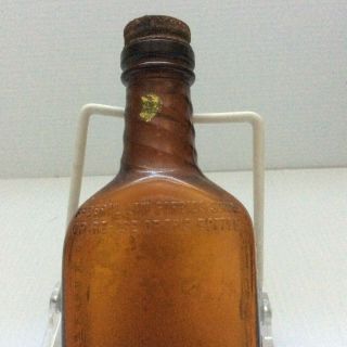 McHenry Bourbon Distillery Vintage 1/2 Pint Amber Liquor Bottle with Lid 6 1/2 