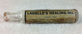 Vintage Ladelle’s Healing Oil Bottle With Label