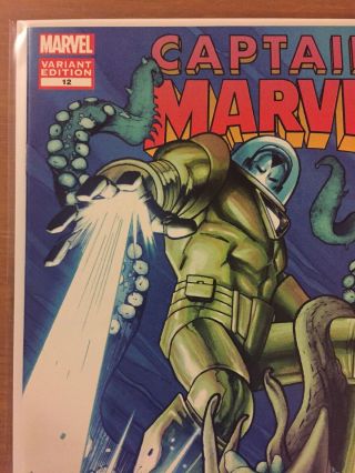 Captain Marvel 12 Greg Land variant NM - Many Armors Of Iron Man 4