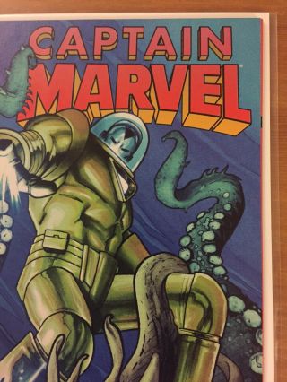 Captain Marvel 12 Greg Land variant NM - Many Armors Of Iron Man 5