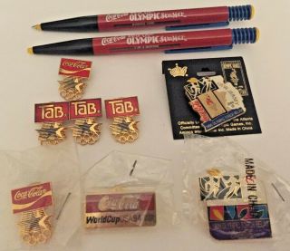 10 Cocacola Collectable Items - 8 Pins And 2 Pens - All Official
