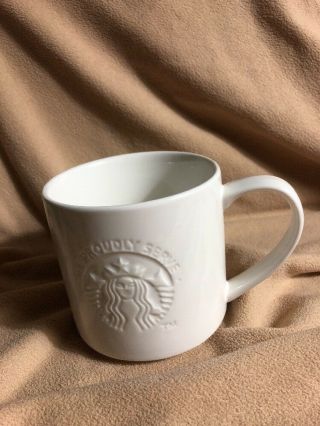 Rare 2012 Starbucks Coffee Mug - Embossed White We Proudly Serve