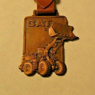 Vintage Adv. ,  Caterpillar Mfg.  Co. ,  Front - End Loader Watch Fob W/strap Leavers
