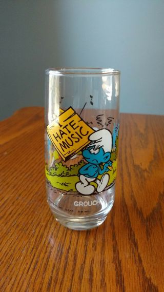 1982,  Smurf,  Grouchy,  " I Hate Music ",  Drinking Glass,  Peyo,  6 " Tall.