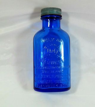 Vintage Advertising Phillips Milk Of Magnesia Embossed Blue Glass Bottle