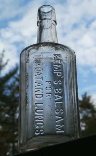 Embossed Antique Respiratory Medicine Cure Bottle,  1800 