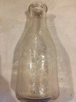 Queen City Dairy Inc.  Cumberland,  Md.  Quart Milk Bottle With Diamond Pattern