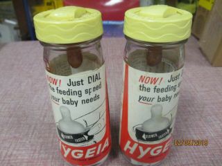 2 Vintage Hygeia 8 Oz.  Glass Baby Bottles Dial Lid Nos