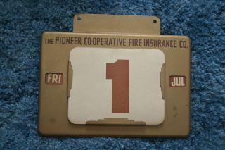 The Pioneer Co - Operative Fire Insurance Co.  Metal Calendar