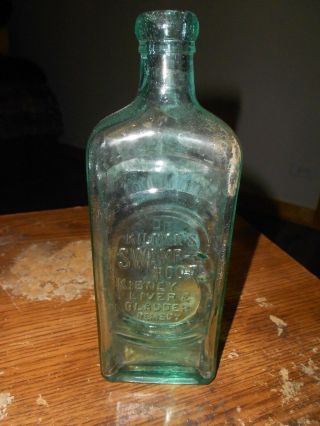 81/4 Inch Vintage Dr.  Kilmers Swamp Root Aqua Bottle In Shape