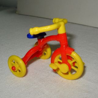 Vintage Renwal hard plastic No 7 tricycle made in US bright red,  yellow & blue 3