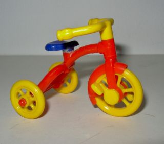 Vintage Renwal hard plastic No 7 tricycle made in US bright red,  yellow & blue 4