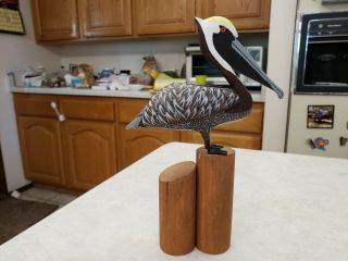 Pelican Sitting On The Dock Hand Carved Out Of Wood Signed Burdick Vintage 1979