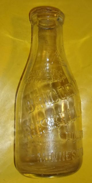 Bridgeman Russell Co.  Round Tall Neck Clear Glass Quart Milk - Embossed Letters