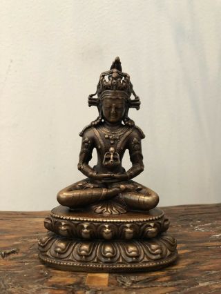 A Tibetan 16th Century bronze figure of Buddha - Chinese,  Indian,  Ming,  Qing 10
