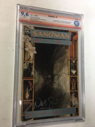 Sandman 1 Cbcs 9.  6 Signed And Remarked By Neil Gaiman