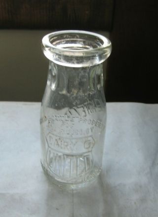 475f - 1 Vintage Embossed Half Pint United Dairy Co.  Chicago,  Illinois Milk Bottle