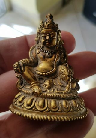 An Antique Small Gilt Bronze Buddha Figure Of Kubera Tibet
