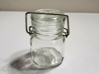 Vintage Clear Glass Jar With Glass Lid Top,  Wire Bale 3.  5  T