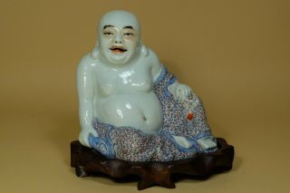 A Chinese Famille - Rose Laughing Buddha With Wood Stand.