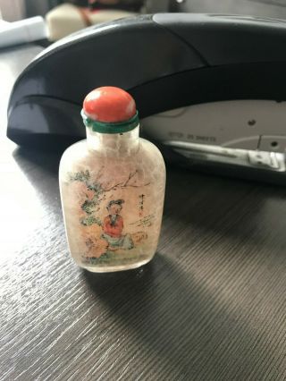 An Inside - Painted Crystal Snuff Bottle.  With Coral Top.