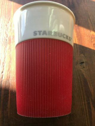 Starbucks Ceramic Travel Mug White Cup With Red Silicone Sleeve,  Ribbed.  8 Ounce